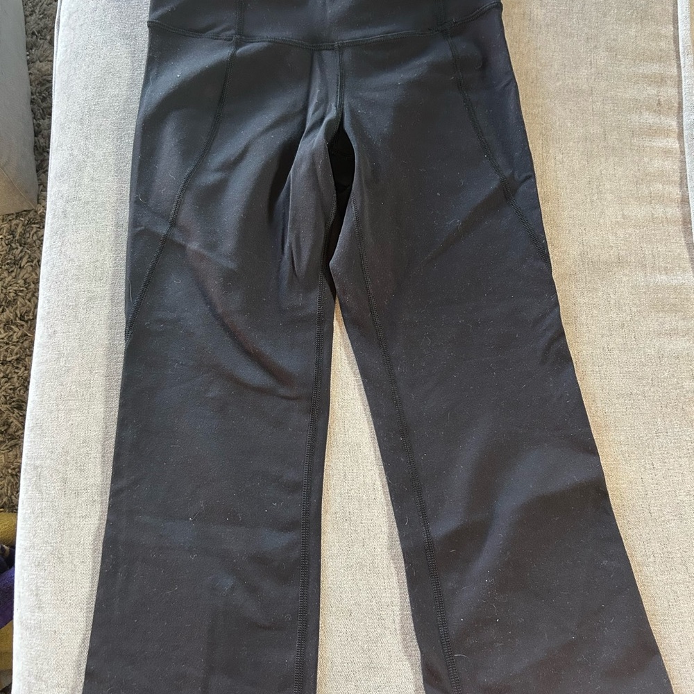 Lululemon Cropped Black Yoga Pants with slits on back. Size 2.